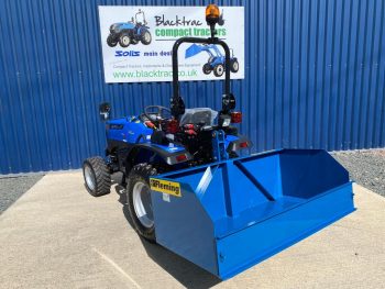 New Fleming 5ft Tipping Transport Box for Compact Tractor shown on the rear of a Solis 26 Compact Tractor